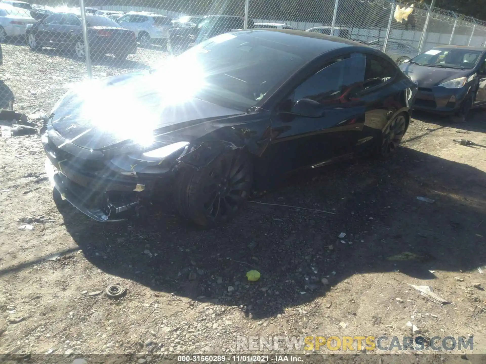 2 Photograph of a damaged car 5YJ3E1EC6MF992353 TESLA MODEL 3 2021