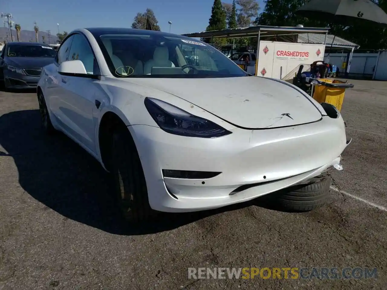 1 Photograph of a damaged car 5YJ3E1EC7MF995634 TESLA MODEL 3 2021