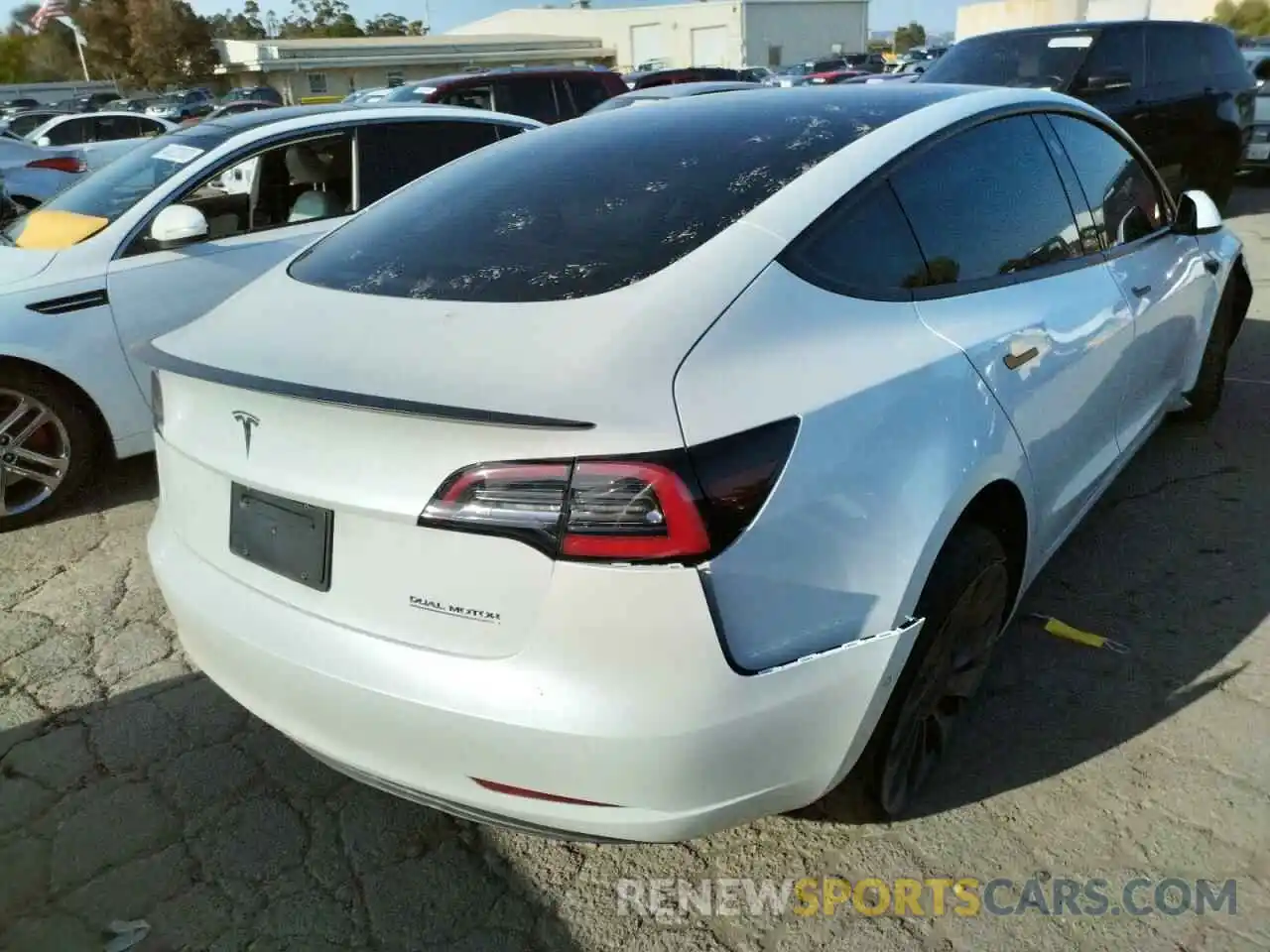 4 Photograph of a damaged car 5YJ3E1EC8MF015750 TESLA MODEL 3 2021