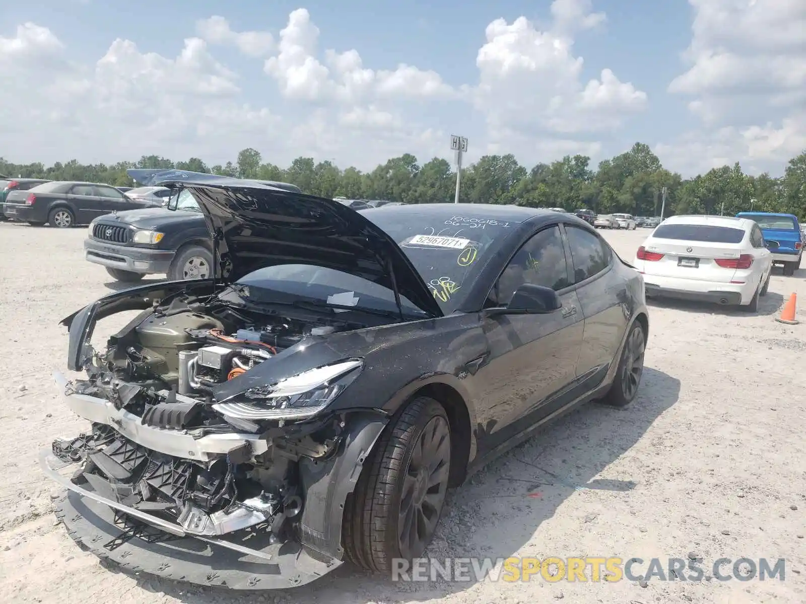 2 Photograph of a damaged car 5YJ3E1EC8MF849498 TESLA MODEL 3 2021