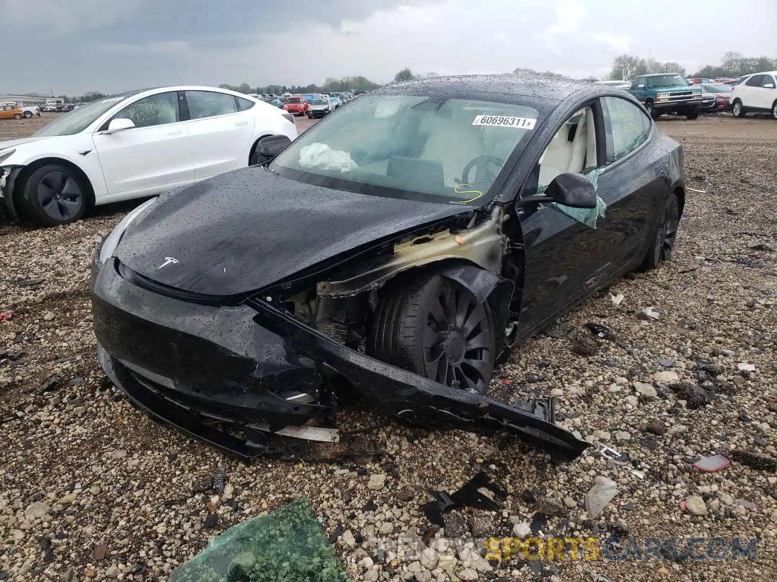 2 Photograph of a damaged car 5YJ3E1EC8MF914298 TESLA MODEL 3 2021