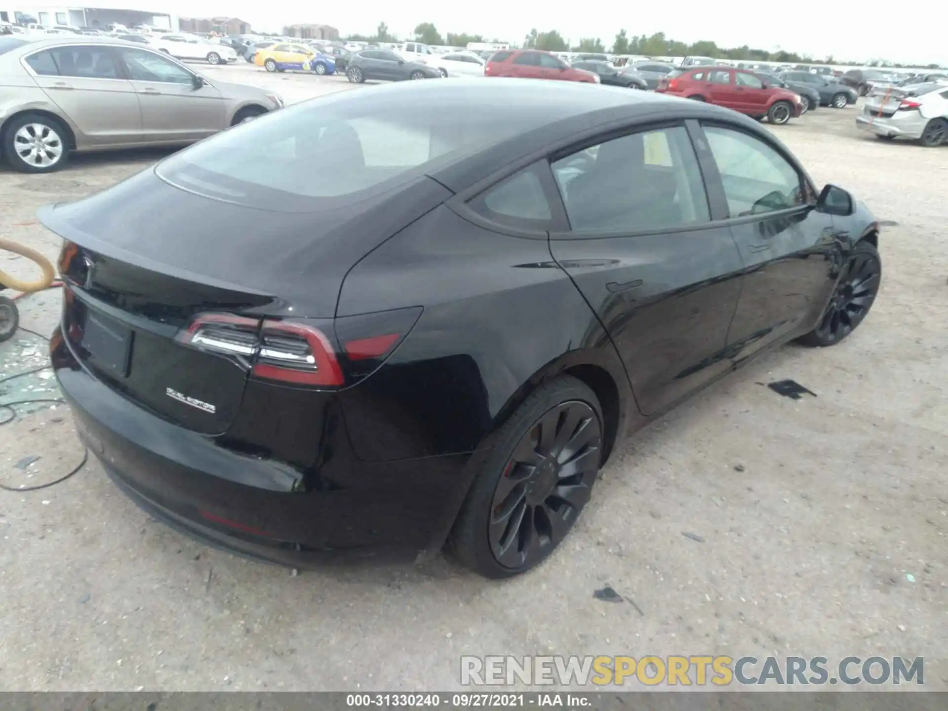 4 Photograph of a damaged car 5YJ3E1EC8MF976008 TESLA MODEL 3 2021