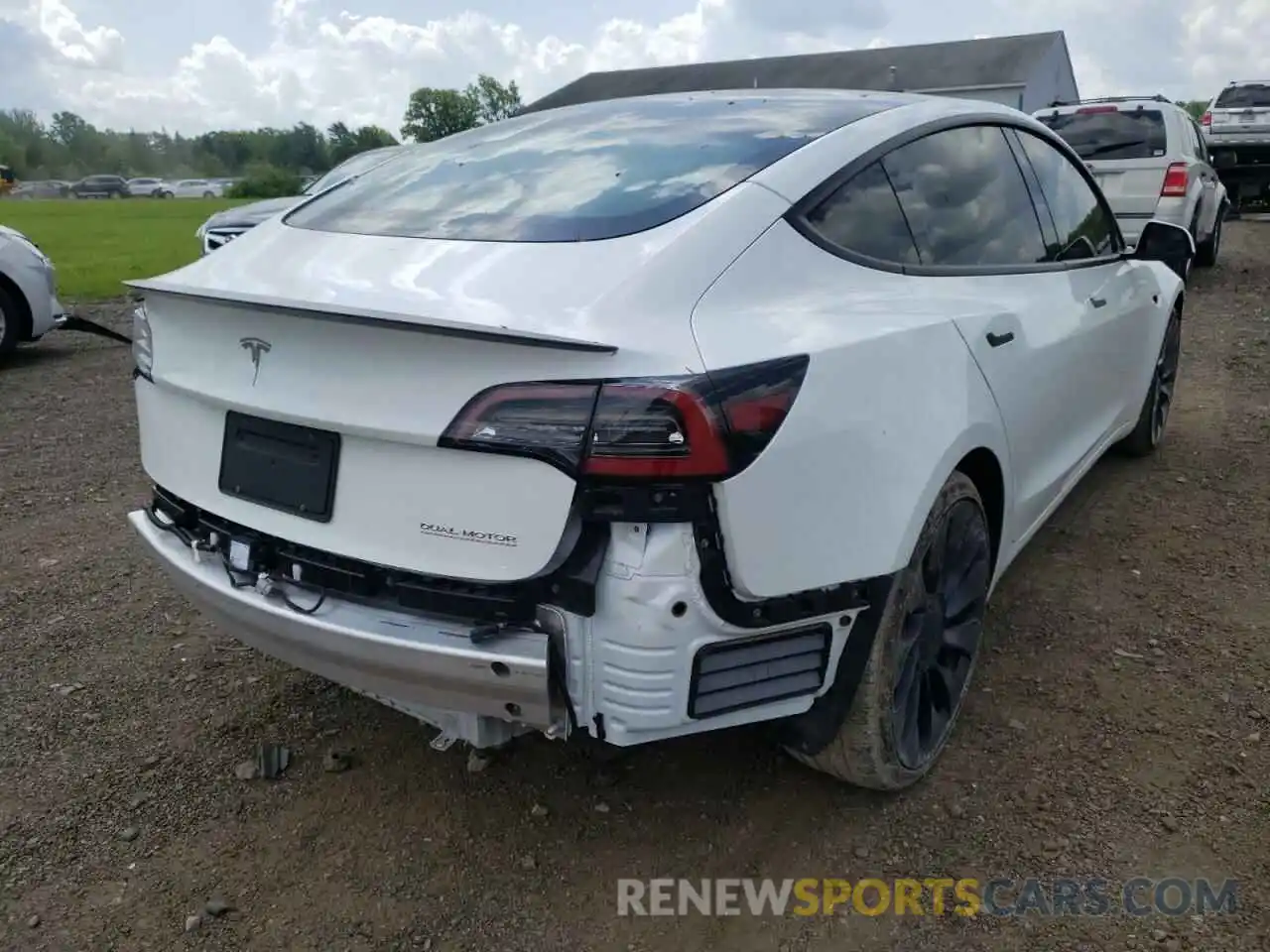 4 Photograph of a damaged car 5YJ3E1EC9MF013425 TESLA MODEL 3 2021