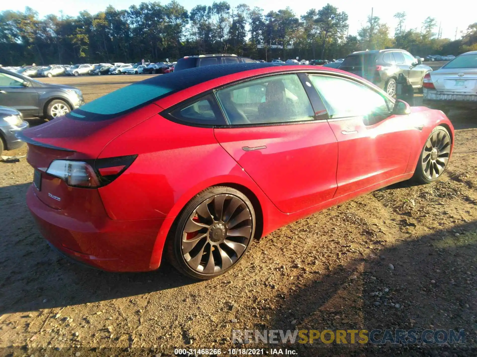 4 Photograph of a damaged car 5YJ3E1EC9MF862647 TESLA MODEL 3 2021