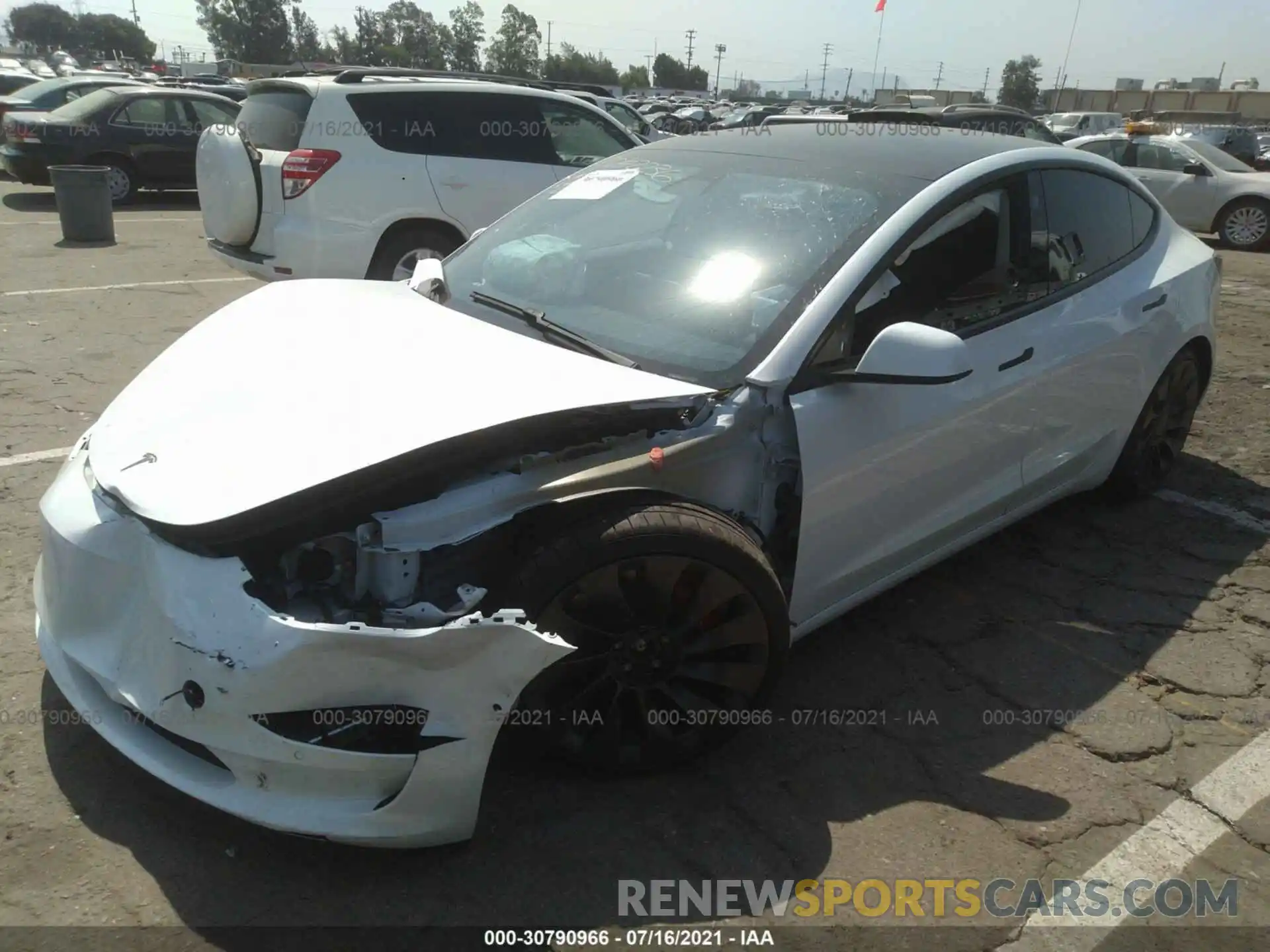 2 Photograph of a damaged car 5YJ3E1EC9MF876239 TESLA MODEL 3 2021