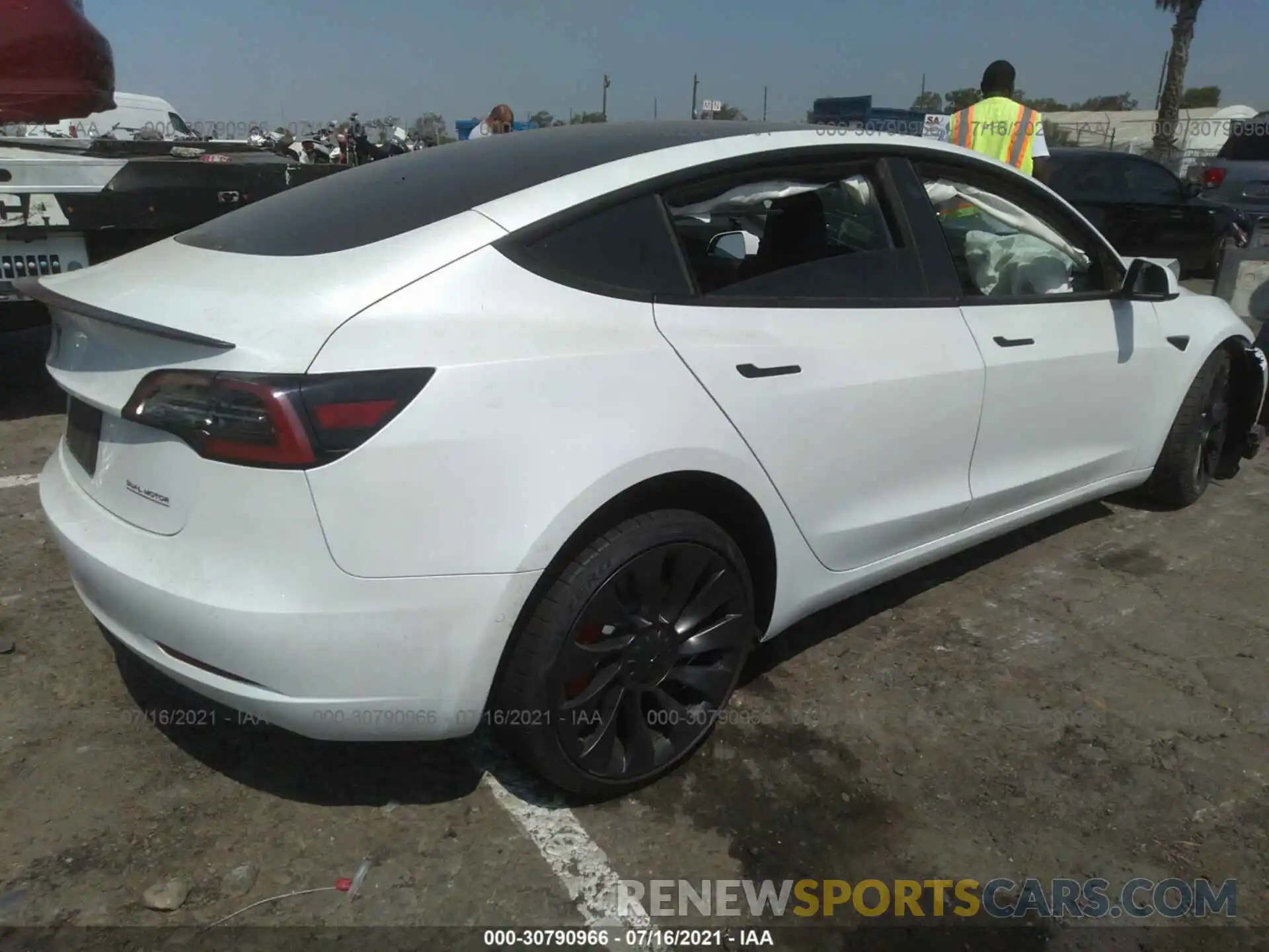 4 Photograph of a damaged car 5YJ3E1EC9MF876239 TESLA MODEL 3 2021