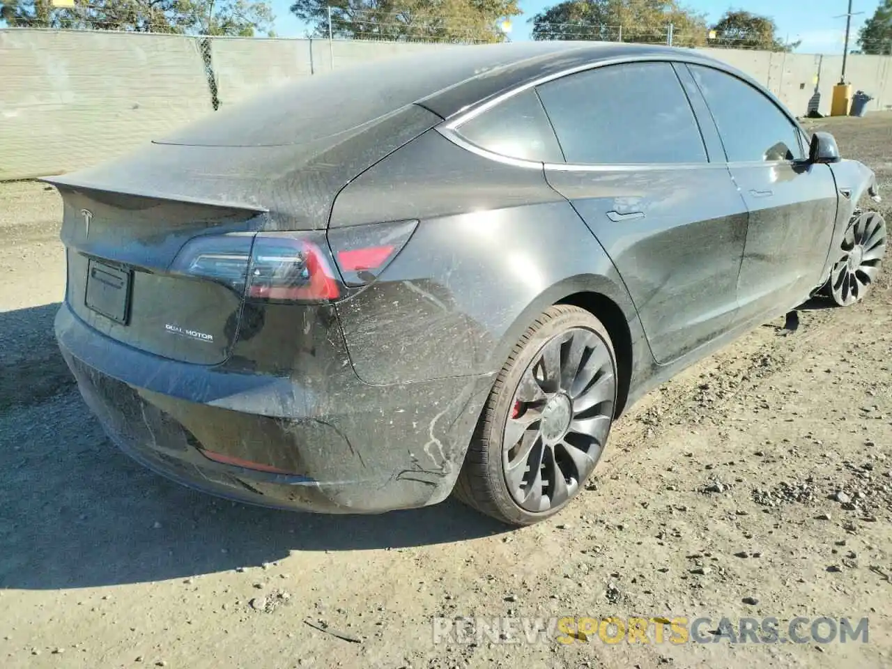 4 Photograph of a damaged car 5YJ3E1ECXMF069809 TESLA MODEL 3 2021