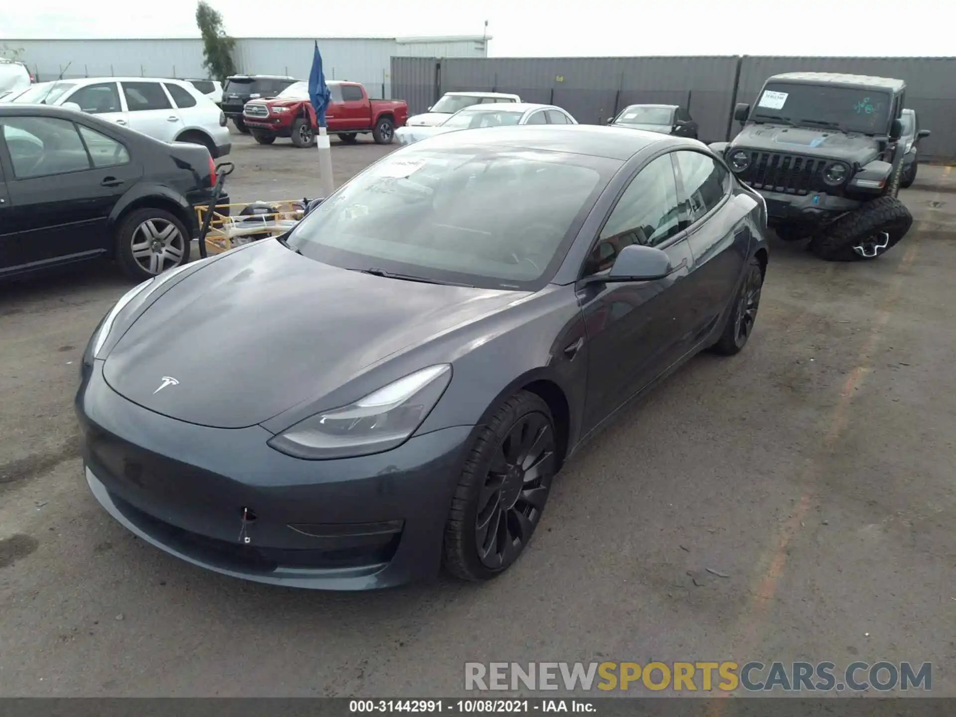 2 Photograph of a damaged car 5YJ3E1ECXMF976060 TESLA MODEL 3 2021