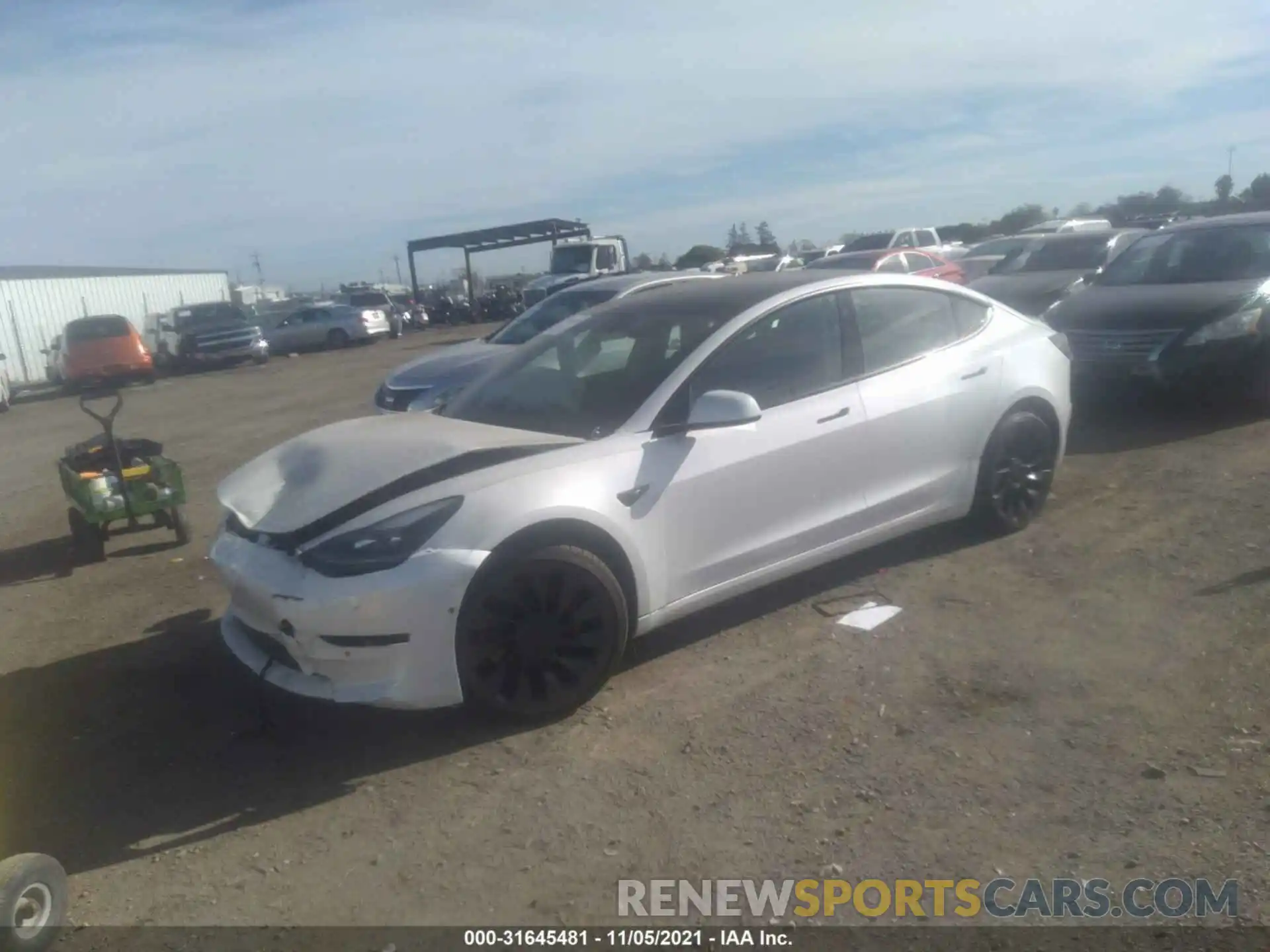 2 Photograph of a damaged car 5YJ3E1ECXMF996857 TESLA MODEL 3 2021