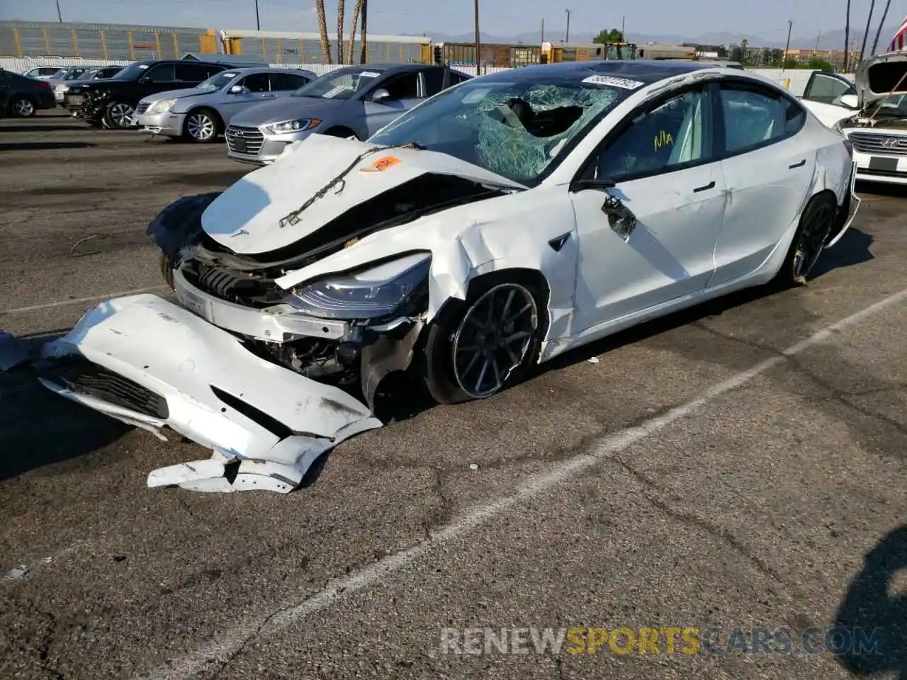 2 Photograph of a damaged car 5YJ3E1EA0NF123134 TESLA MODEL 3 2022