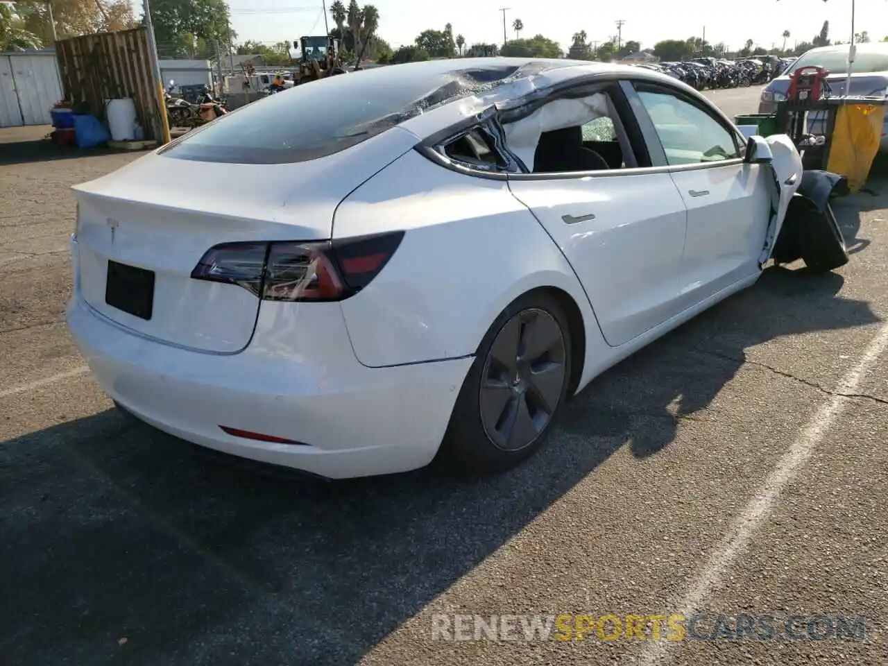 4 Photograph of a damaged car 5YJ3E1EA0NF123134 TESLA MODEL 3 2022