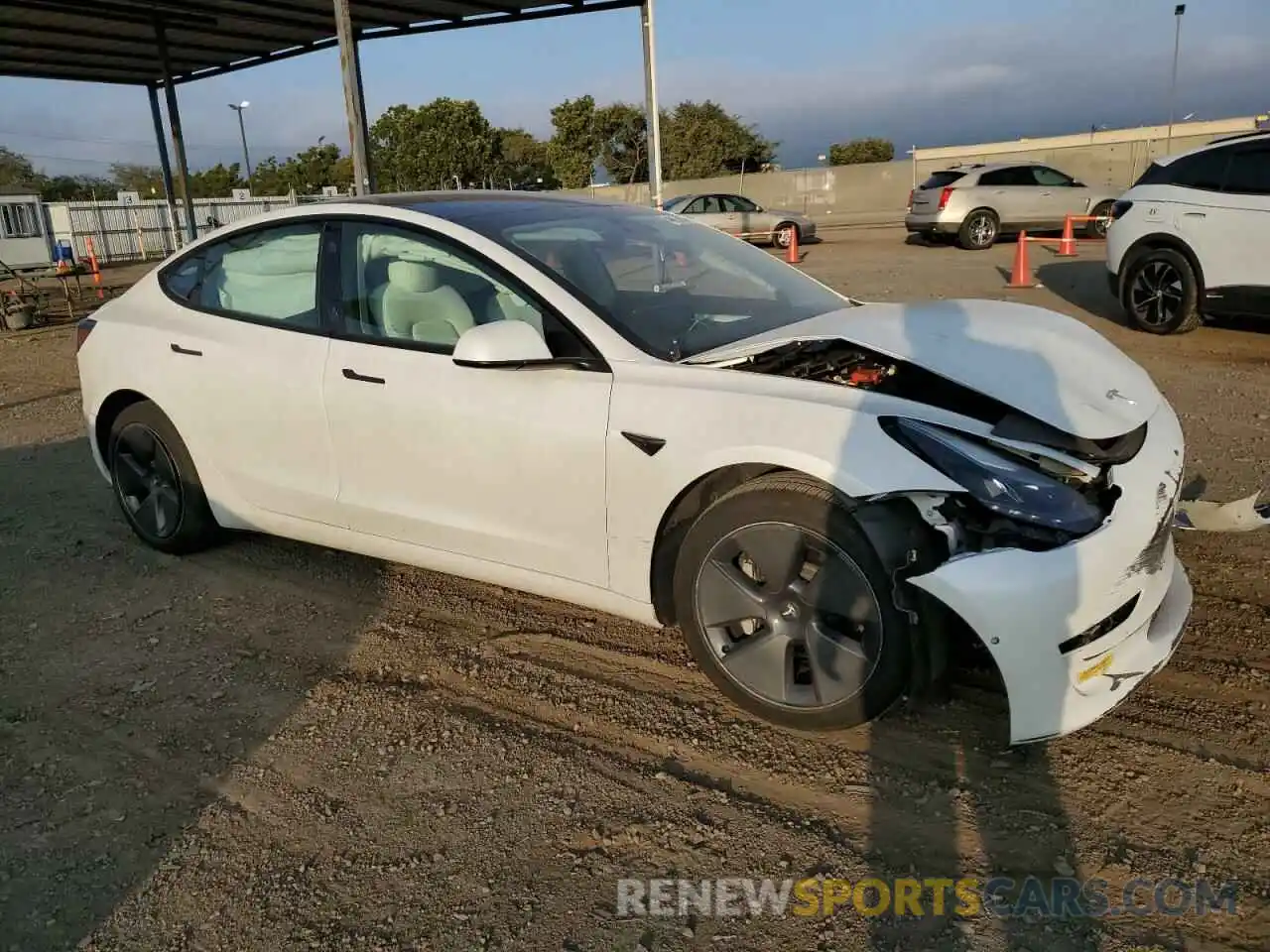 4 Photograph of a damaged car 5YJ3E1EA0NF147997 TESLA MODEL 3 2022