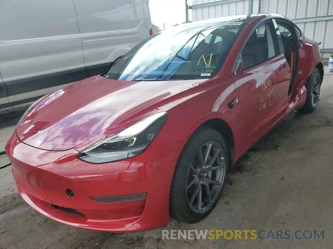 2 Photograph of a damaged car 5YJ3E1EA0NF186685 TESLA MODEL 3 2022