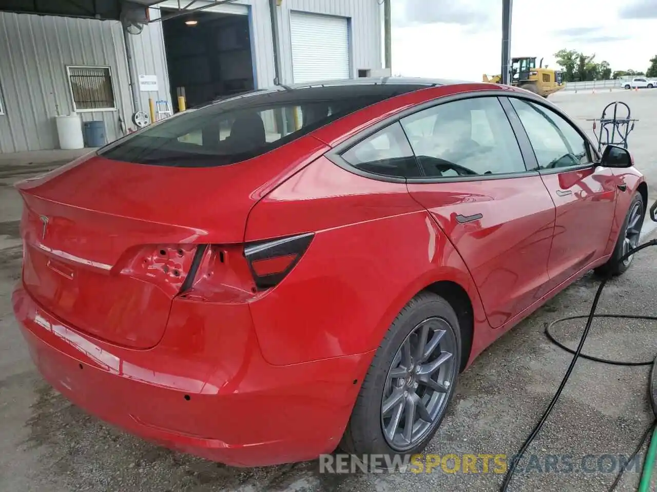 4 Photograph of a damaged car 5YJ3E1EA0NF186685 TESLA MODEL 3 2022