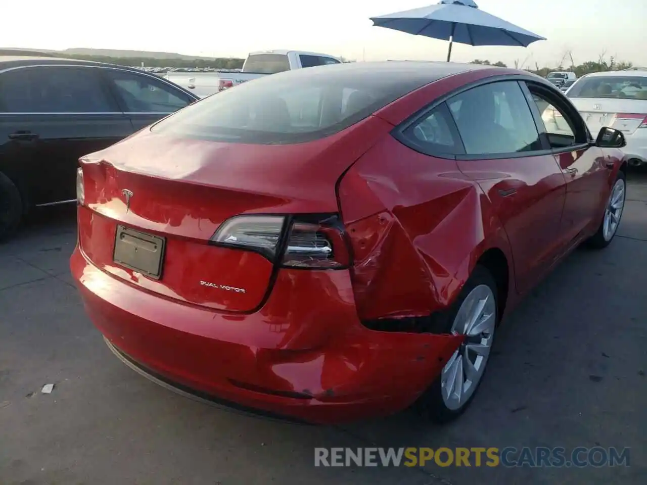 4 Photograph of a damaged car 5YJ3E1EA0NF188906 TESLA MODEL 3 2022