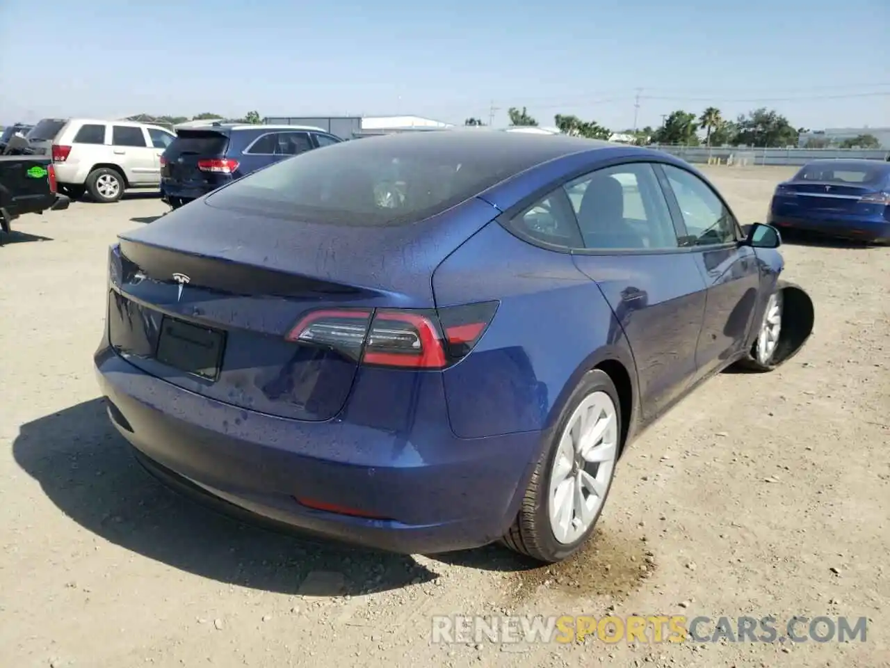 4 Photograph of a damaged car 5YJ3E1EA0NF189621 TESLA MODEL 3 2022