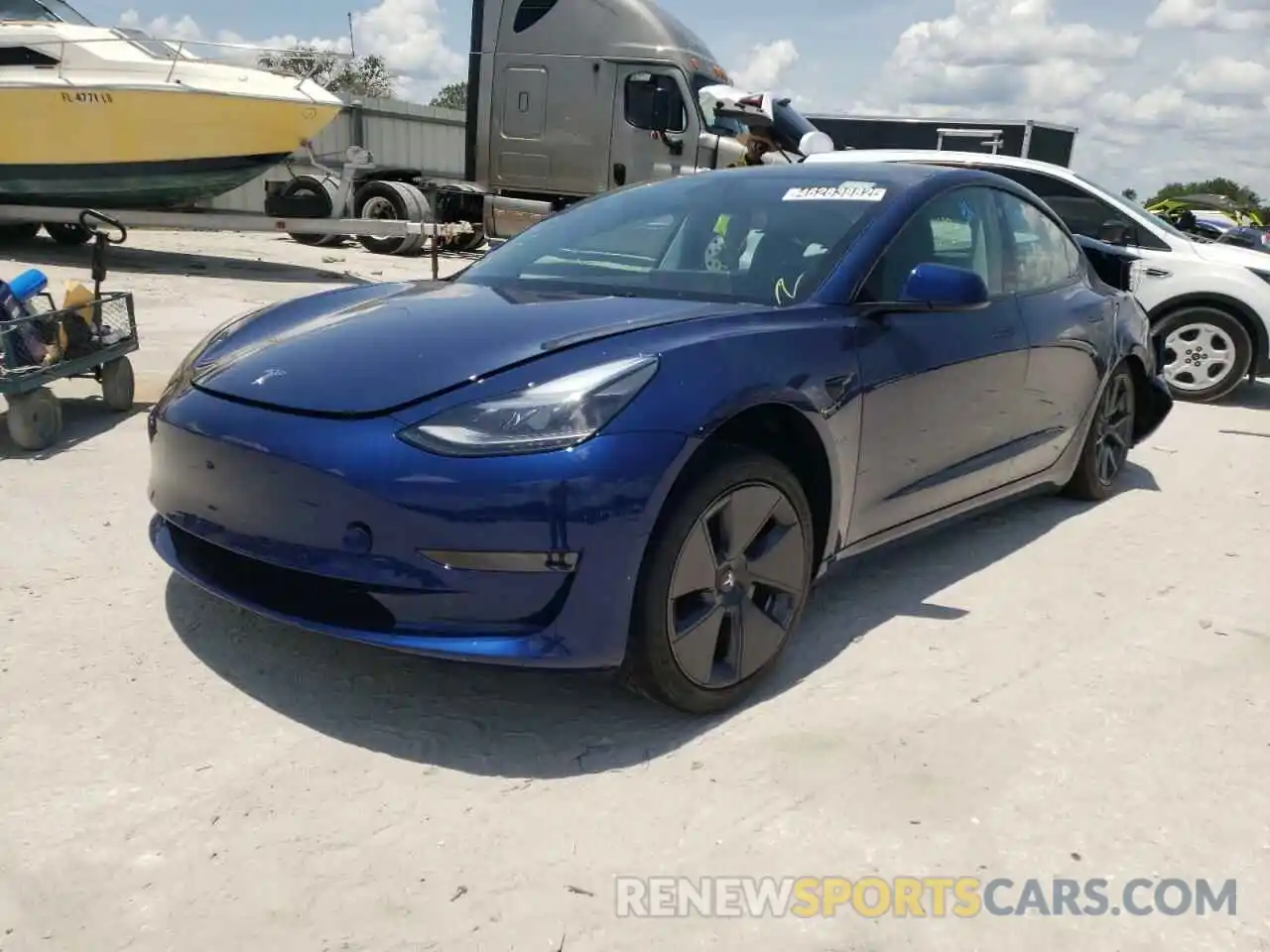 2 Photograph of a damaged car 5YJ3E1EA0NF189974 TESLA MODEL 3 2022