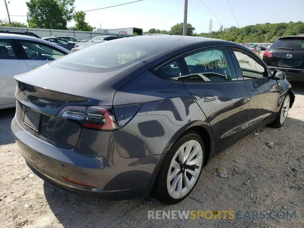 4 Photograph of a damaged car 5YJ3E1EA0NF192082 TESLA MODEL 3 2022