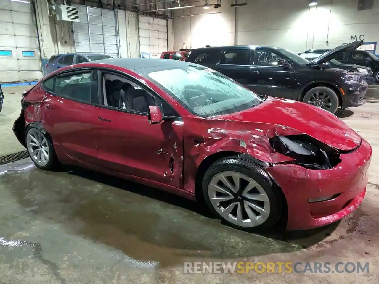 4 Photograph of a damaged car 5YJ3E1EA0NF304752 TESLA MODEL 3 2022