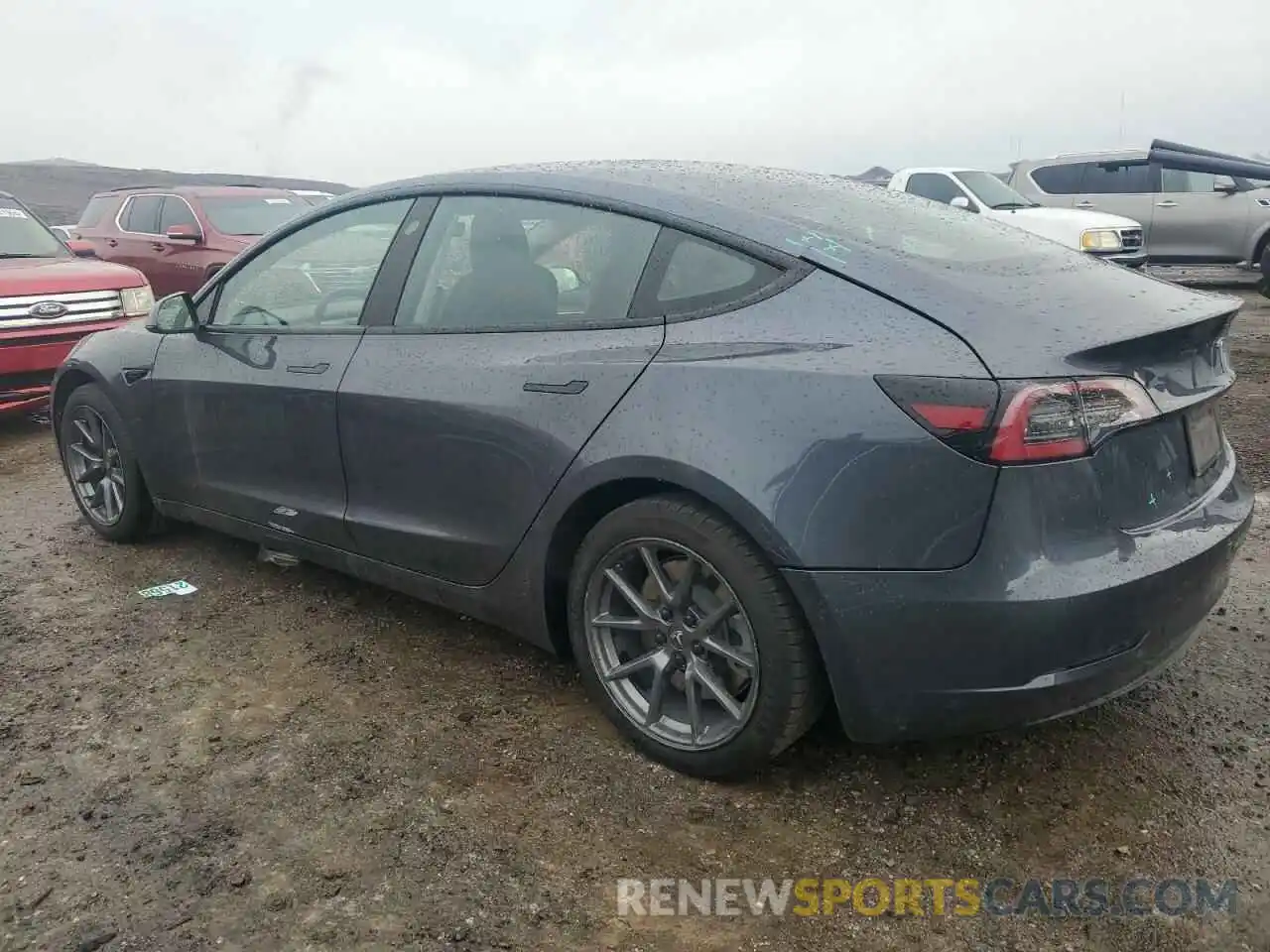 2 Photograph of a damaged car 5YJ3E1EA0NF317937 TESLA MODEL 3 2022