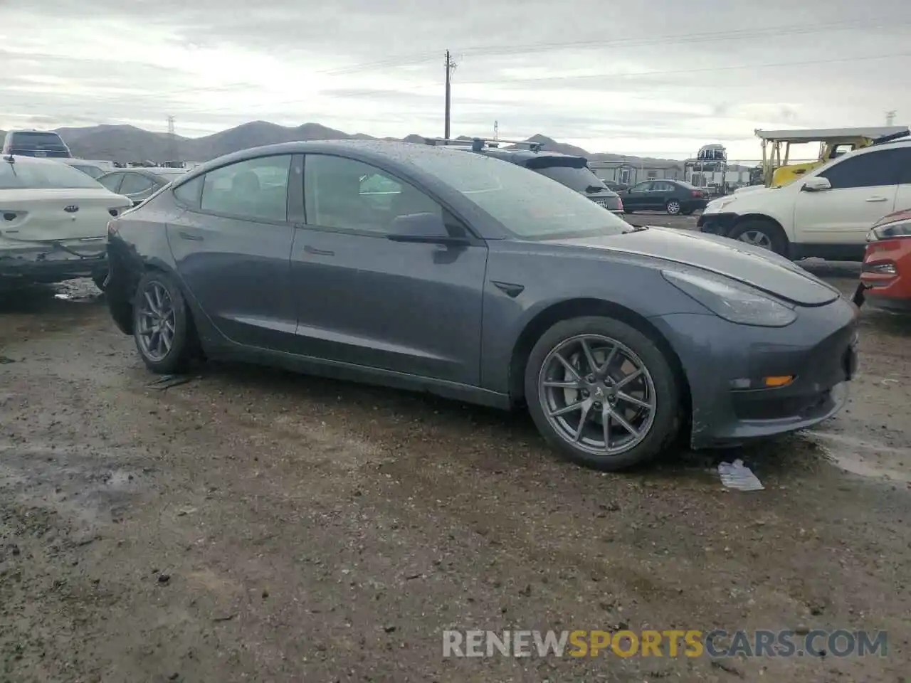 4 Photograph of a damaged car 5YJ3E1EA0NF317937 TESLA MODEL 3 2022