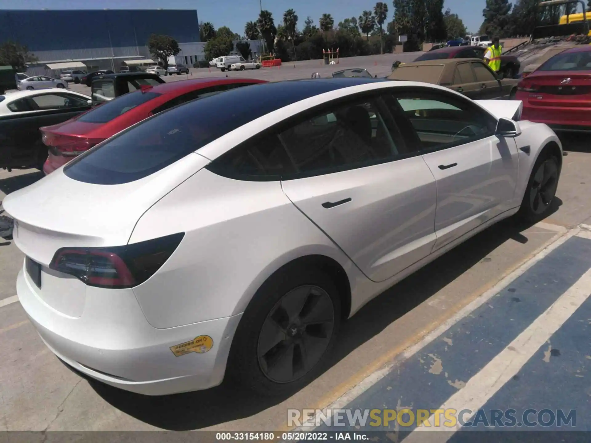 4 Photograph of a damaged car 5YJ3E1EA1NF102891 TESLA MODEL 3 2022