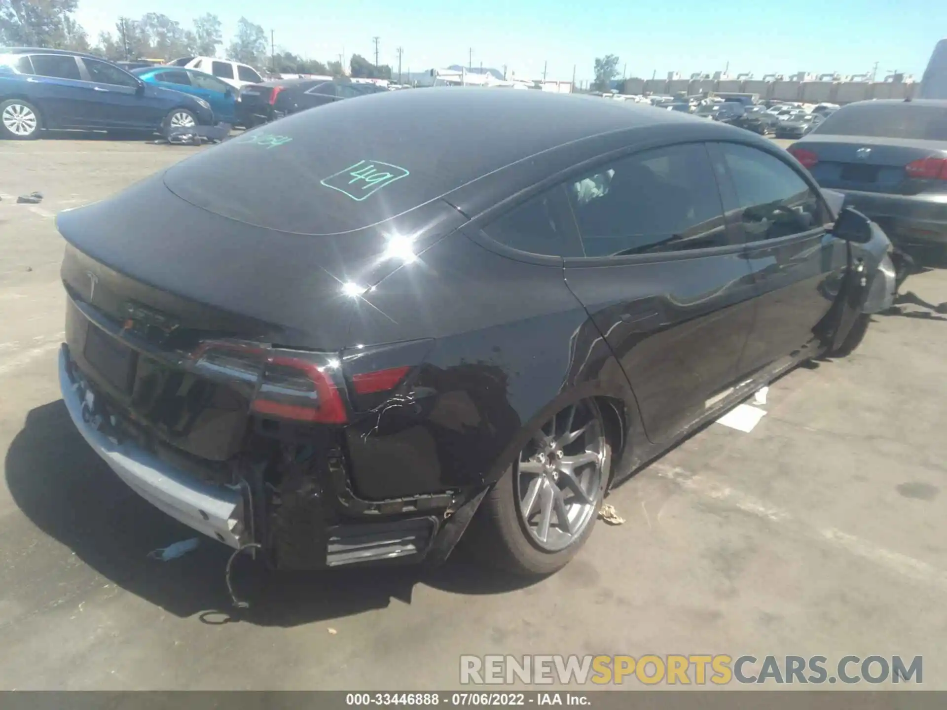 4 Photograph of a damaged car 5YJ3E1EA1NF104415 TESLA MODEL 3 2022