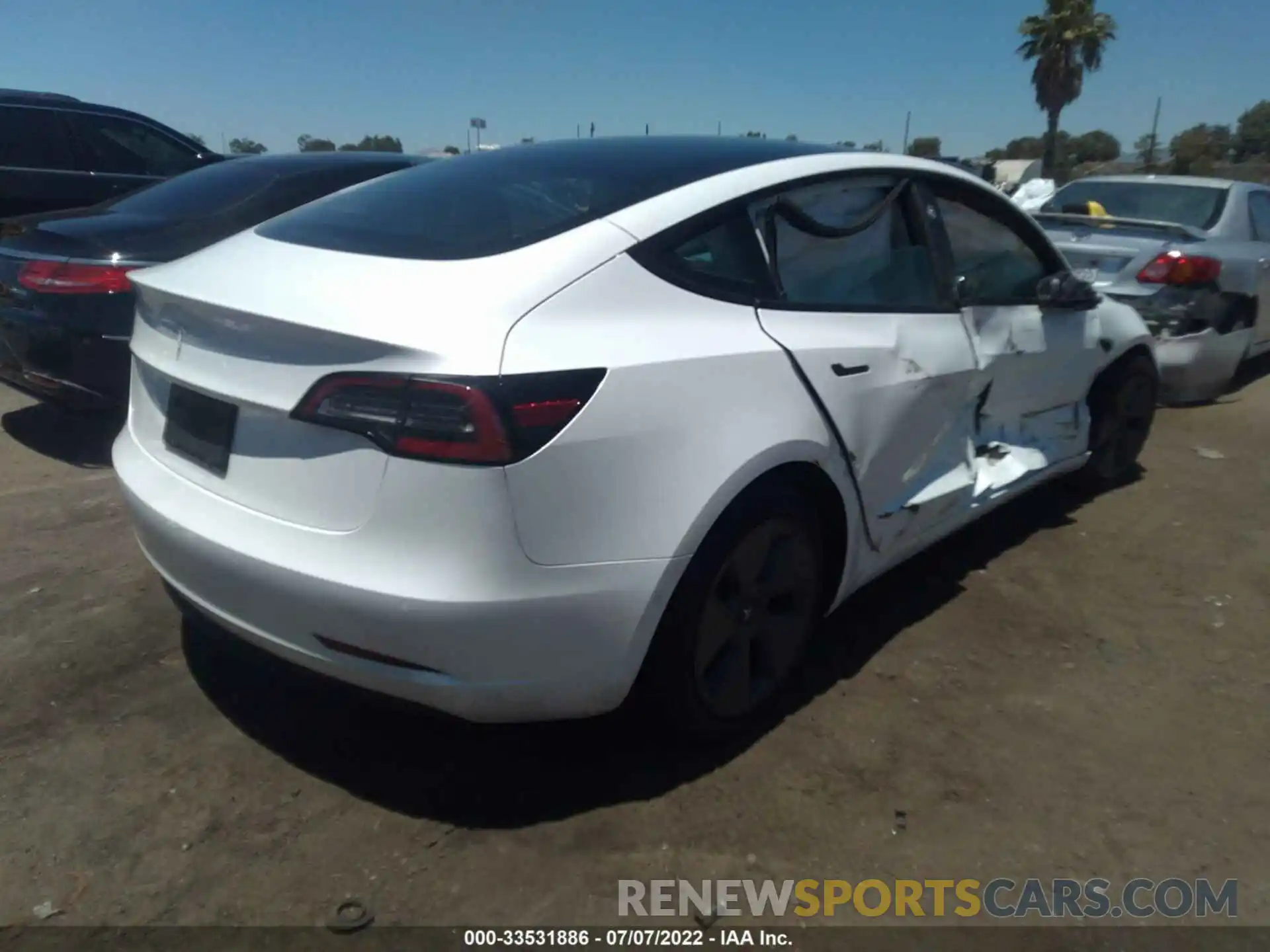 4 Photograph of a damaged car 5YJ3E1EA1NF107105 TESLA MODEL 3 2022