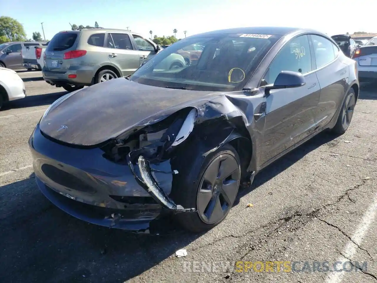 2 Photograph of a damaged car 5YJ3E1EA1NF163917 TESLA MODEL 3 2022