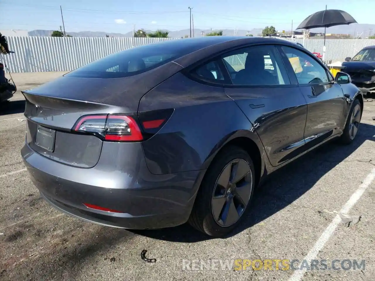 4 Фотография поврежденного автомобиля 5YJ3E1EA1NF163917 TESLA MODEL 3 2022