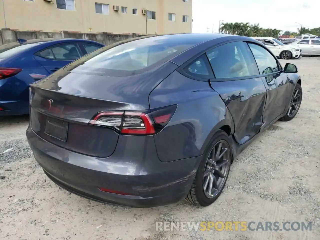 4 Photograph of a damaged car 5YJ3E1EA1NF187148 TESLA MODEL 3 2022