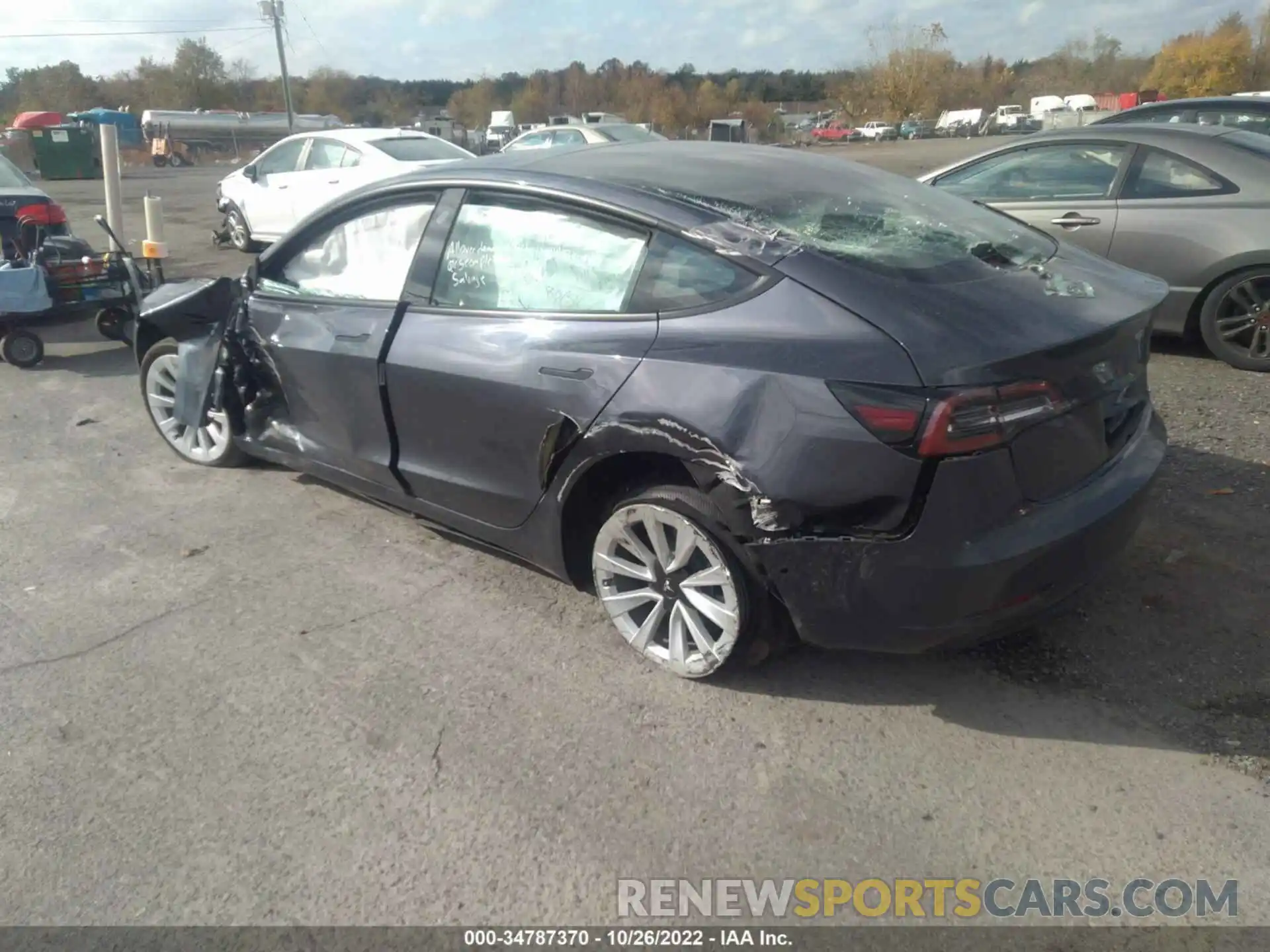 3 Photograph of a damaged car 5YJ3E1EA1NF188963 TESLA MODEL 3 2022