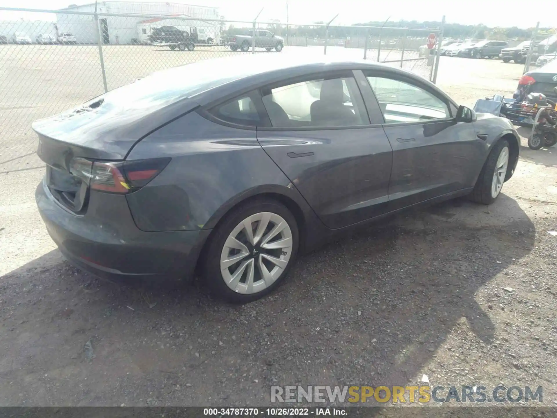 4 Photograph of a damaged car 5YJ3E1EA1NF188963 TESLA MODEL 3 2022