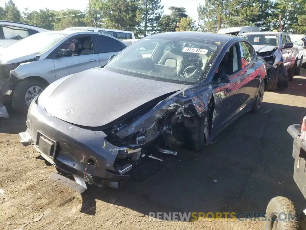 2 Photograph of a damaged car 5YJ3E1EA1NF189997 TESLA MODEL 3 2022