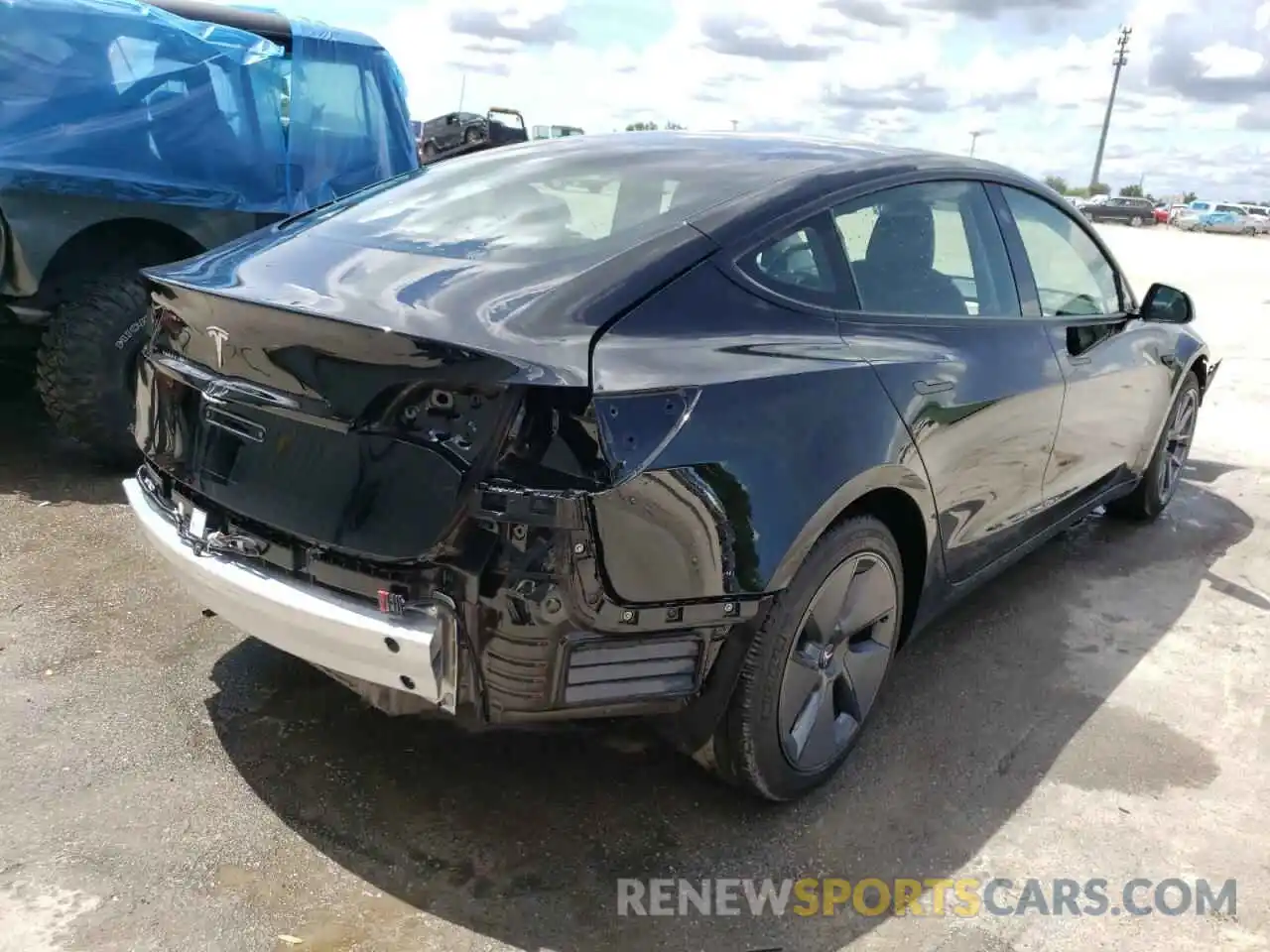 4 Photograph of a damaged car 5YJ3E1EA1NF190065 TESLA MODEL 3 2022