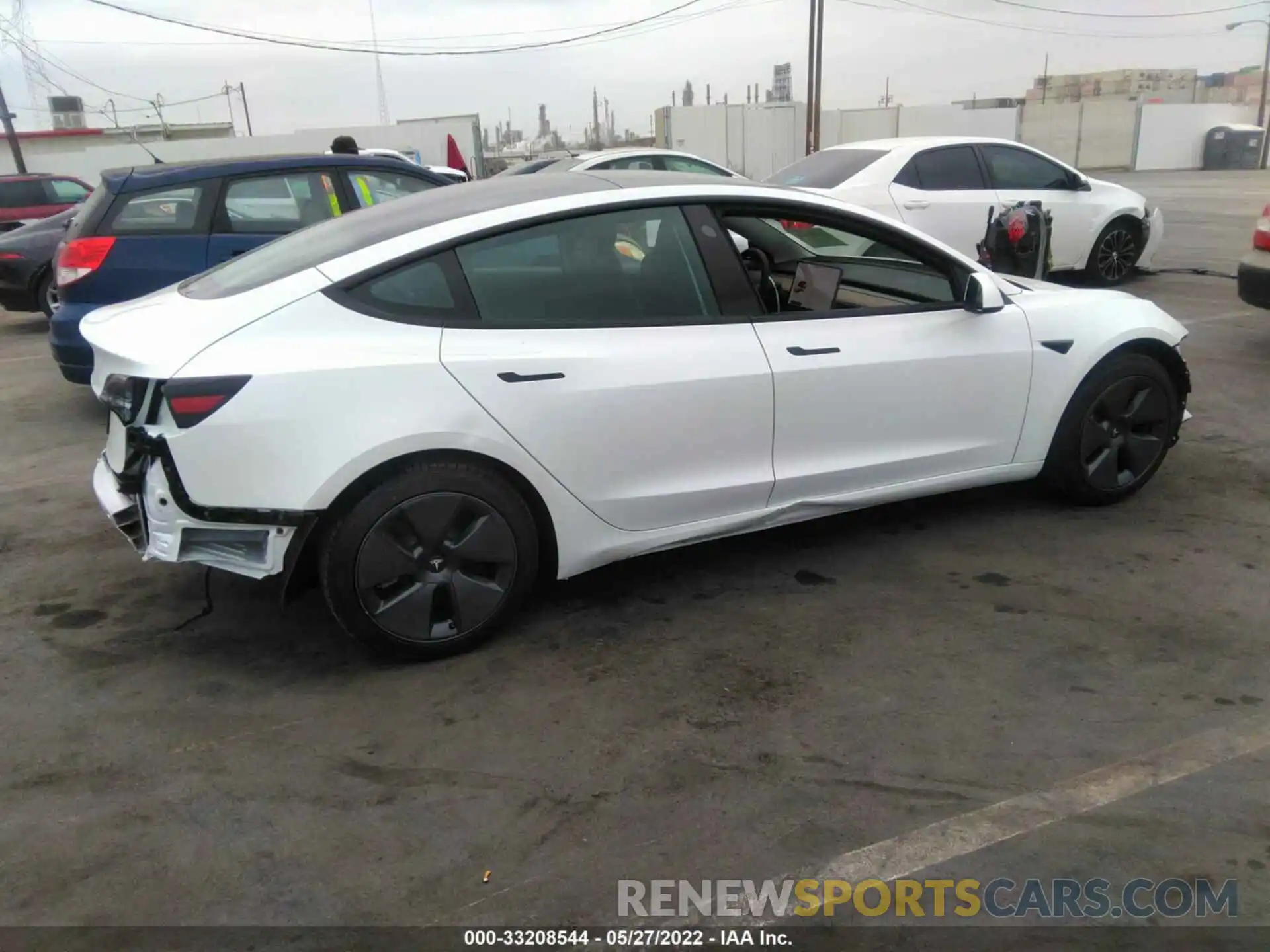 4 Фотография поврежденного автомобиля 5YJ3E1EA1NF199087 TESLA MODEL 3 2022