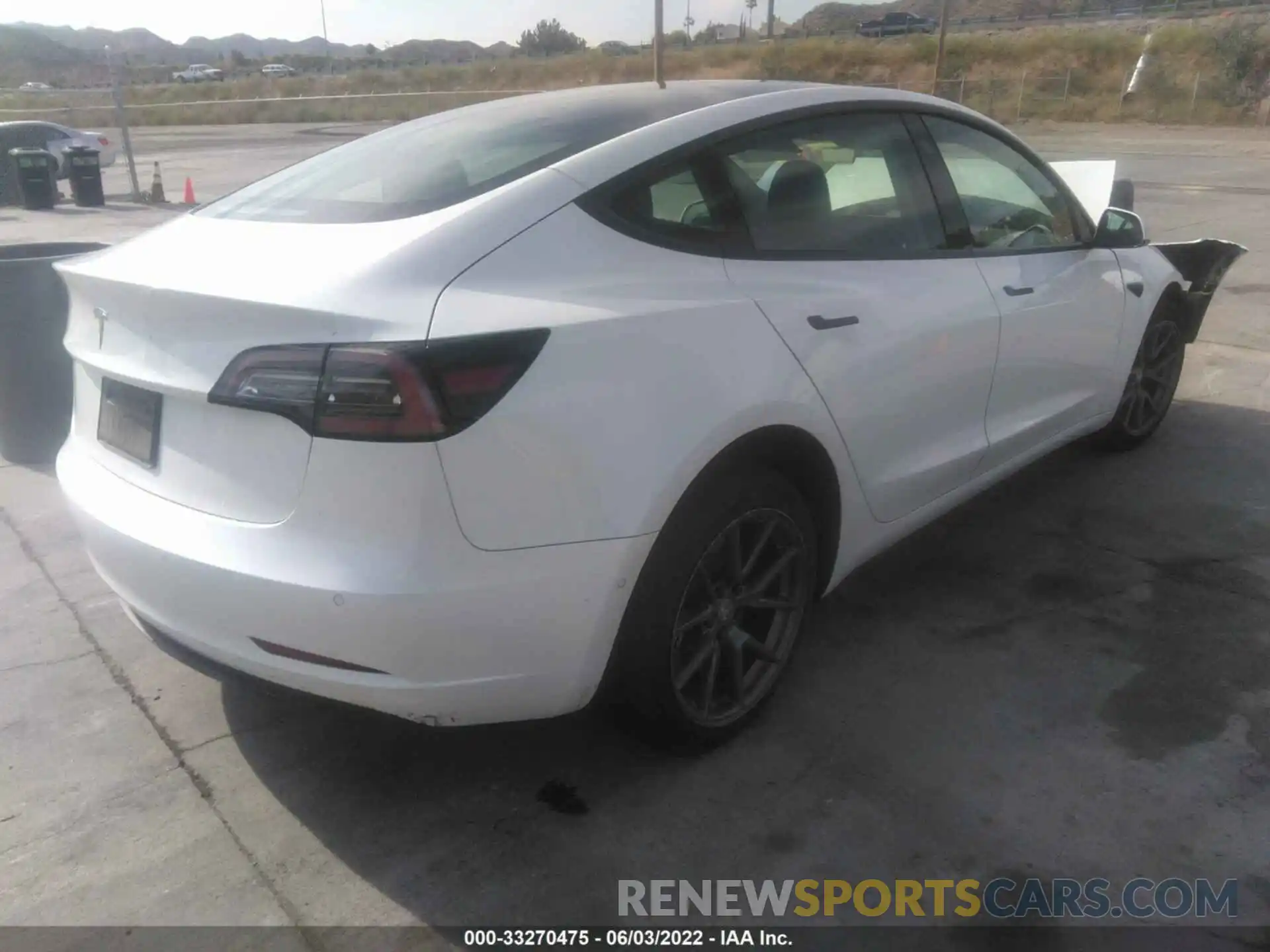 4 Фотография поврежденного автомобиля 5YJ3E1EA2NF109705 TESLA MODEL 3 2022