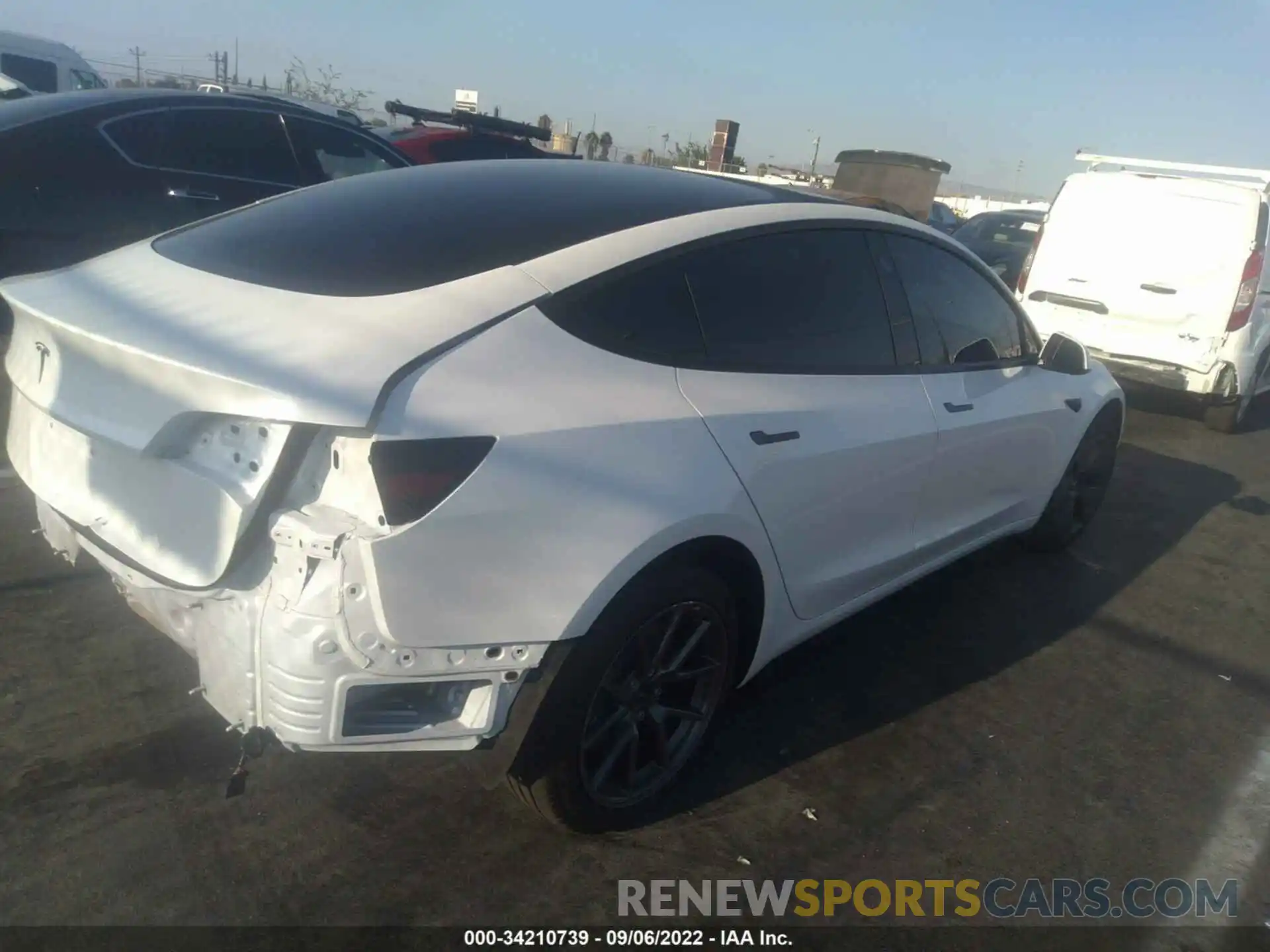 4 Photograph of a damaged car 5YJ3E1EA2NF110448 TESLA MODEL 3 2022