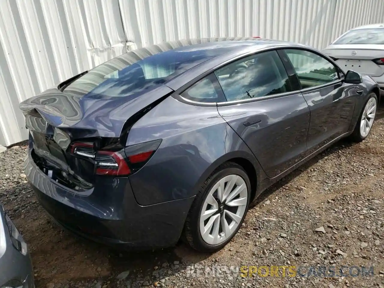 4 Photograph of a damaged car 5YJ3E1EA2NF190821 TESLA MODEL 3 2022