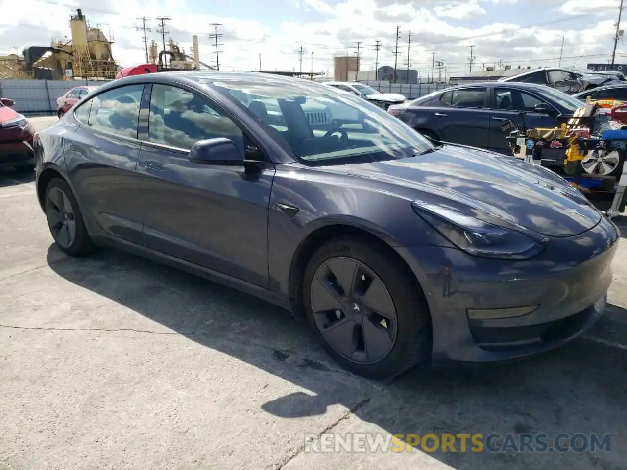 4 Photograph of a damaged car 5YJ3E1EA2NF212865 TESLA MODEL 3 2022