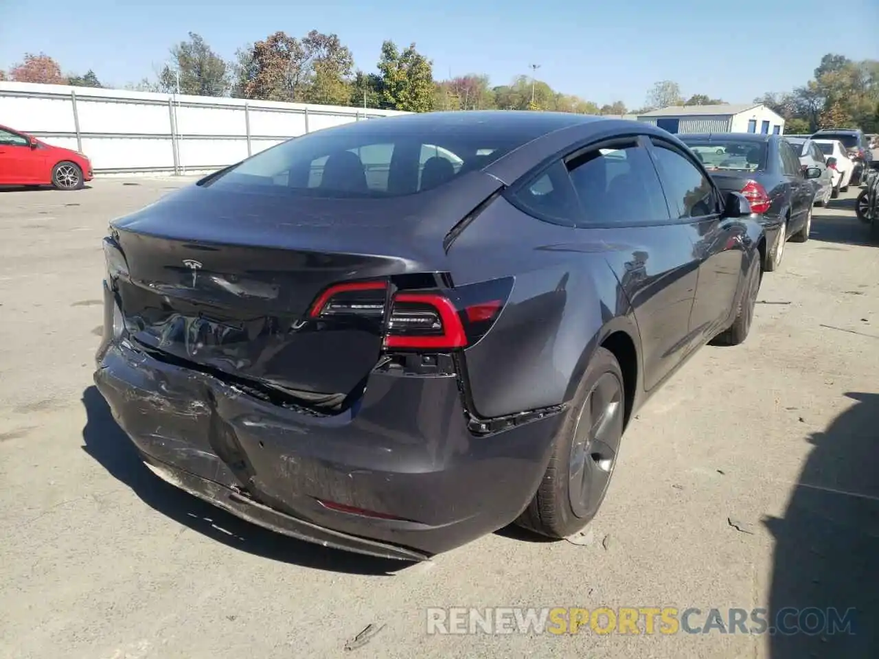 4 Photograph of a damaged car 5YJ3E1EA2NF230668 TESLA MODEL 3 2022