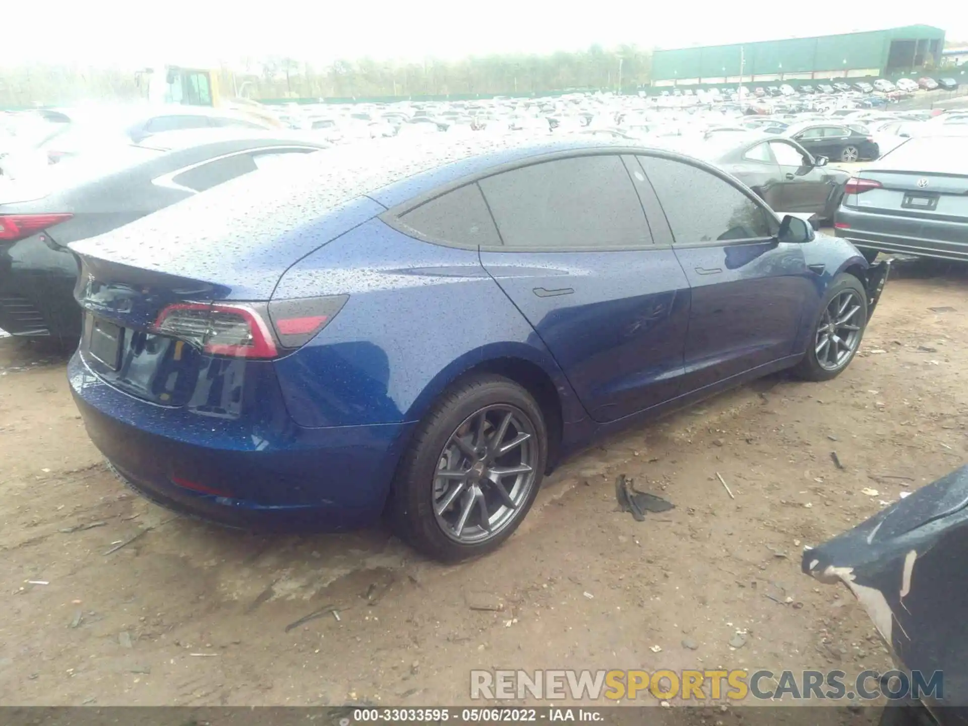 4 Photograph of a damaged car 5YJ3E1EA3NF124214 TESLA MODEL 3 2022