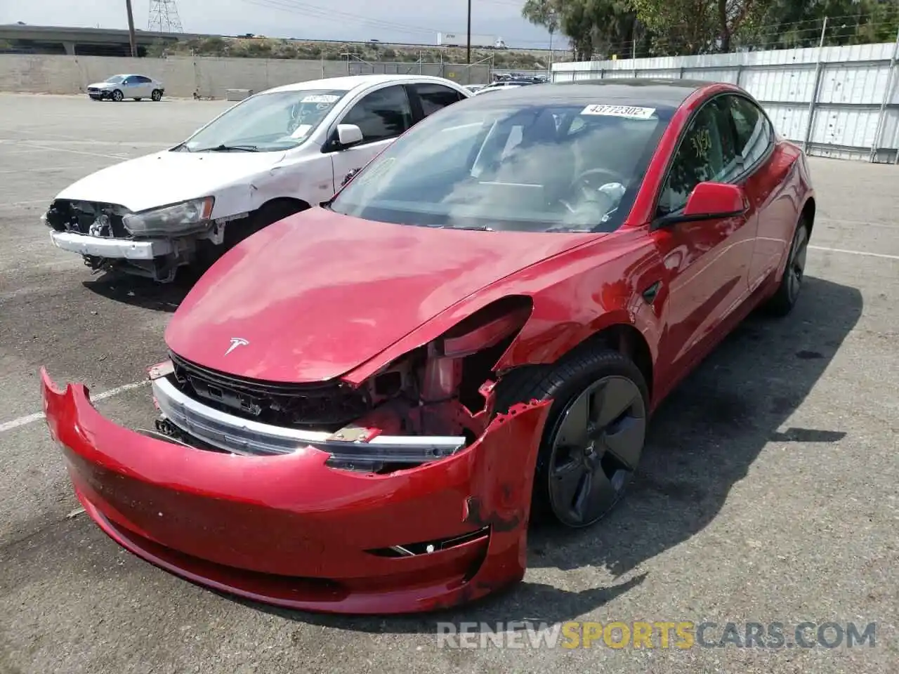 2 Photograph of a damaged car 5YJ3E1EA3NF134290 TESLA MODEL 3 2022