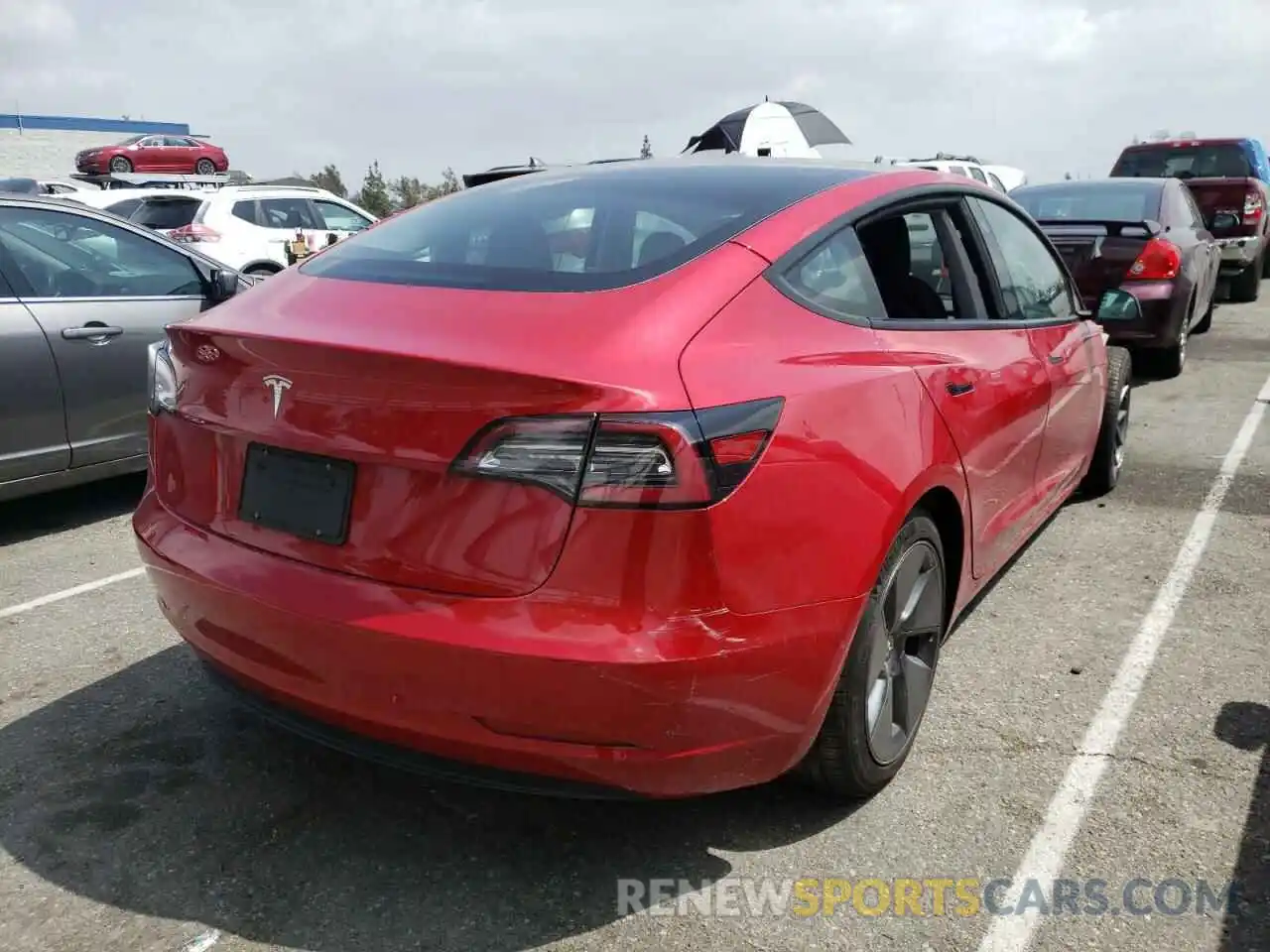 4 Photograph of a damaged car 5YJ3E1EA3NF134290 TESLA MODEL 3 2022