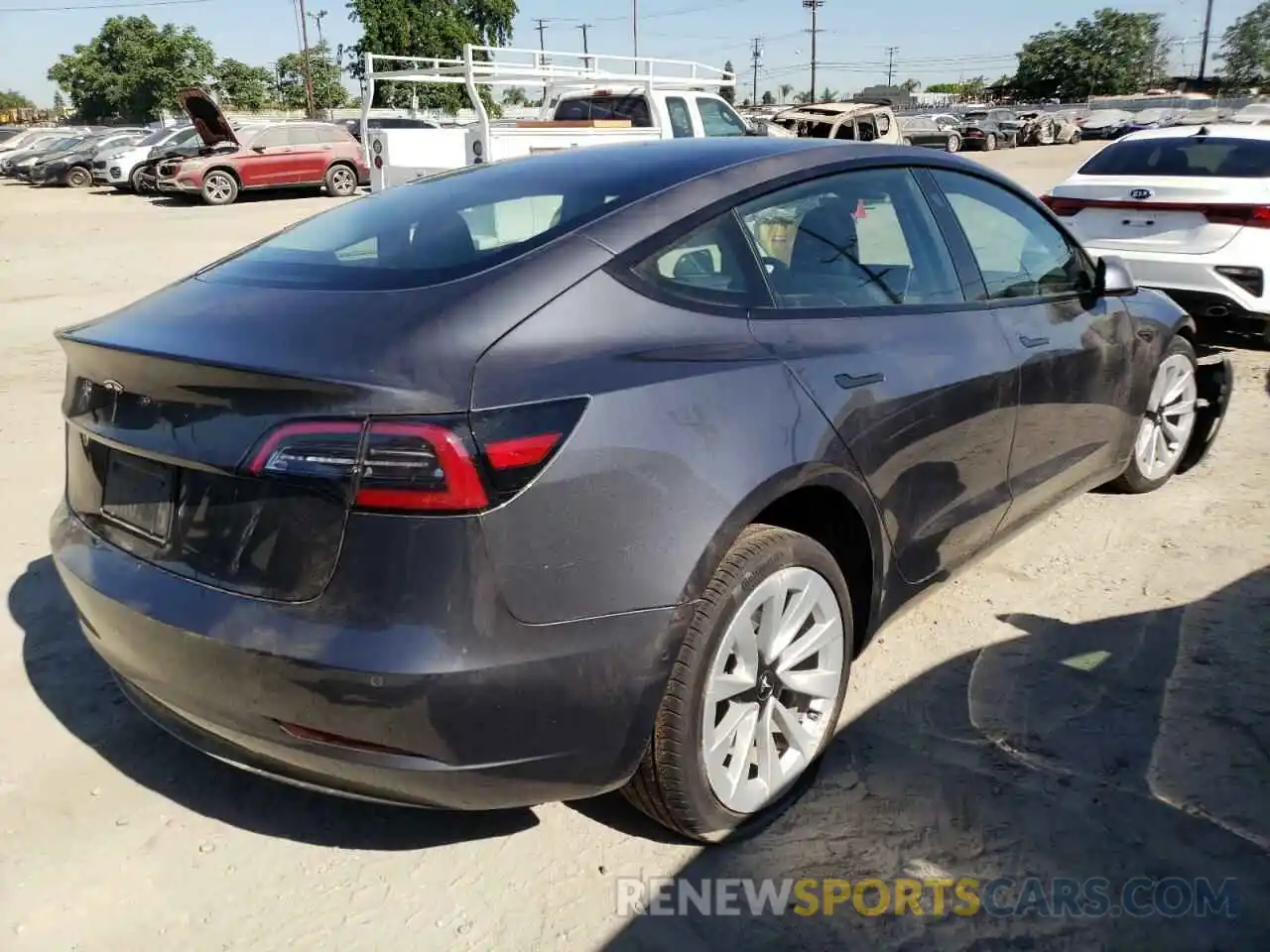 4 Photograph of a damaged car 5YJ3E1EA3NF143829 TESLA MODEL 3 2022