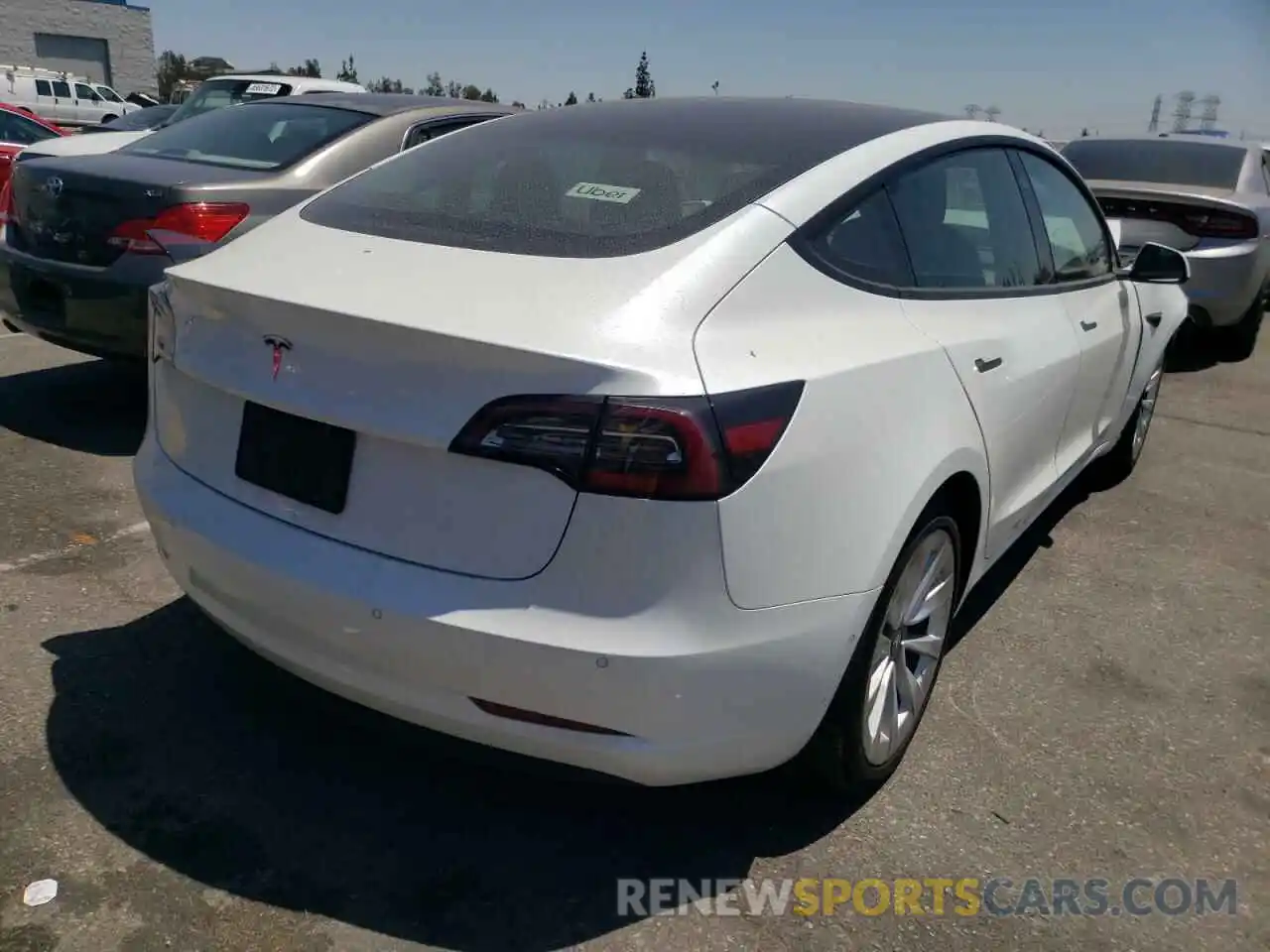 4 Photograph of a damaged car 5YJ3E1EA3NF144110 TESLA MODEL 3 2022