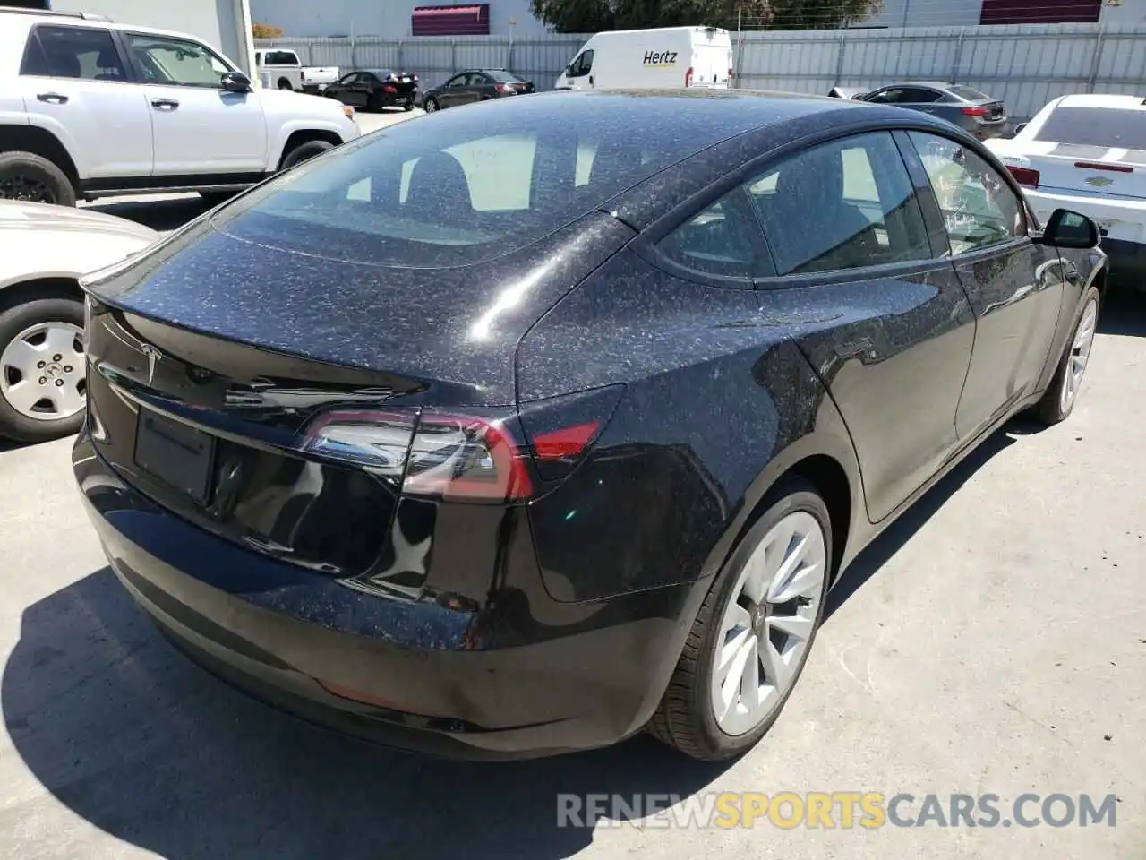 4 Photograph of a damaged car 5YJ3E1EA3NF188057 TESLA MODEL 3 2022