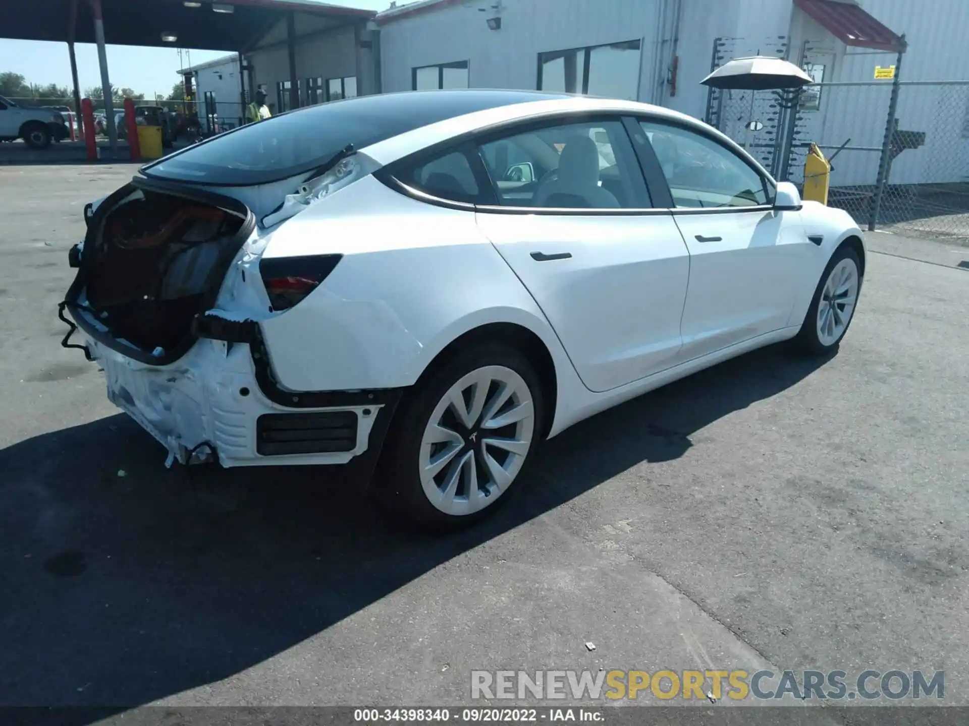 4 Photograph of a damaged car 5YJ3E1EA3NF242361 TESLA MODEL 3 2022