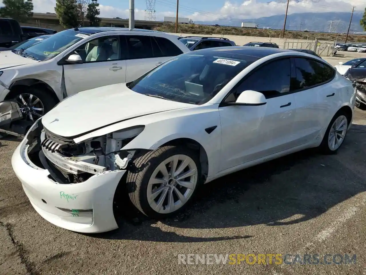 1 Photograph of a damaged car 5YJ3E1EA3NF299076 TESLA MODEL 3 2022