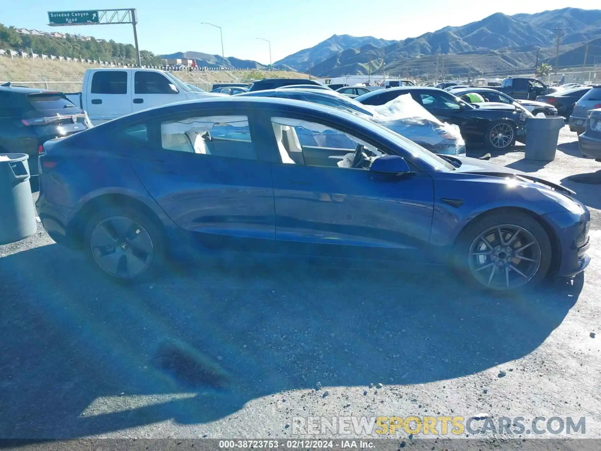 14 Photograph of a damaged car 5YJ3E1EA3NF373998 TESLA MODEL 3 2022